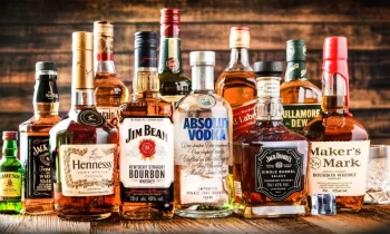different types of hard liquor bottles on the table 1024x549 1