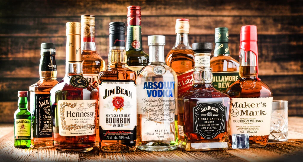 different types of hard liquor bottles on the table 1024x549 1